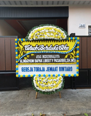 Papan Bunga Duka di Sakra Timur
